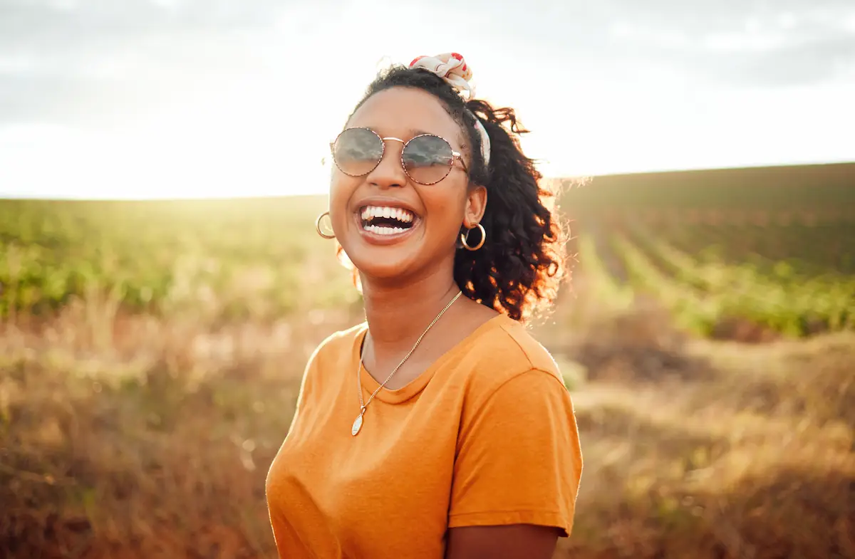 Woman smiling outdoors